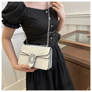 Chic cream marble texture crossbody bag with large rhinestone buckle and chain strap