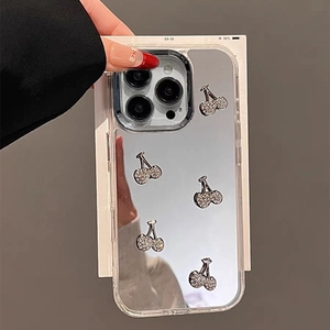 Mirror finish iPhone case with sparkling rhinestone cherries and elegant hand strap