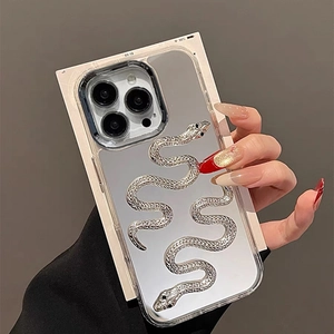 Silver mirror phone case with embossed snake design for iPhone 16 Pro Max