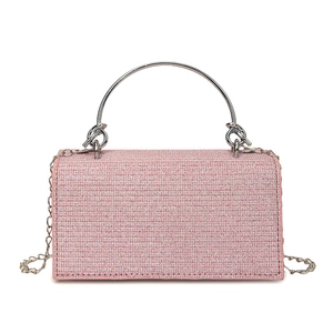 Elegant pink rhinestone evening clutch bag with round silver handle and chain strap