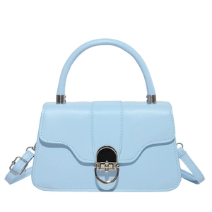 Light blue faux leather crossbody bag with silver oval metal lock and top handle