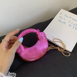 Metallic pink woven crescent handbag with gold chain strap for stylish summer women's fashion