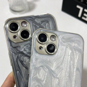 Detailed view of marble texture phone case with glitter and metallic edge for iPhone