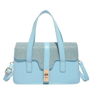 Elegant light blue summer handbag with sparkling glitter flap and gold twist lock