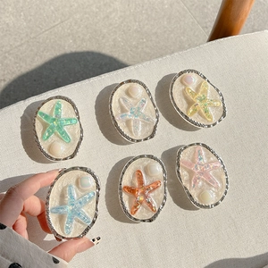 Oval starfish phone grip with resin texture and faux pearl in six assorted colors