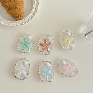 Set of 6 colorful starfish resin phone grips with oval metal frame and pearl accents