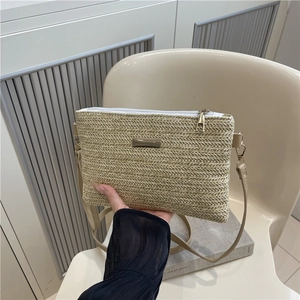 Minimalist beige woven crossbody bag with gold hardware for summer casual style