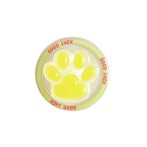 Support de téléphone patte de chat jaune avec texte Good Luck sur fond blanc