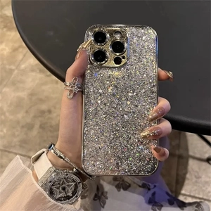 Luxury silver glitter sparkle phone case for iPhone 17 Pro Max held in hand at night