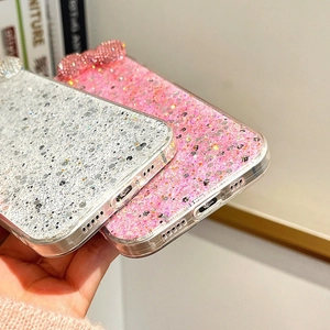 Detailed view of the glitter backplate and precise bottom speaker cutouts for iPhone case