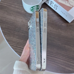 Close-up of sparkling silver glitter phone case with electroplated edges on iPhone