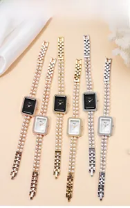 Detailed view of women's quartz watch featuring double-row pearl strap and crystal bezel