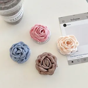 Support De Téléphone Fleur De Camélia En Tissu Support Airbag Pliable Style Ins Coréen Floral Élégant Pour Femmes Filles