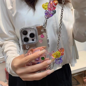 Mirror iPhone case with pink heart grip and colorful resin heart charm metal chain