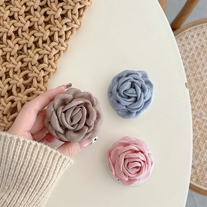 Supports pliables pour téléphone en tissu avec fleurs de camélia en kaki, bleu et rose
