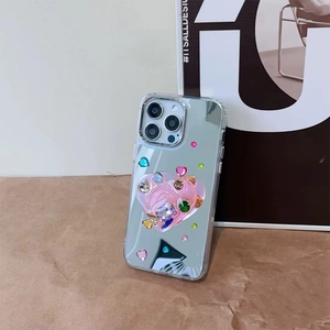 Detail of mirror iPhone case with pink heart pop socket and colorful rhinestones