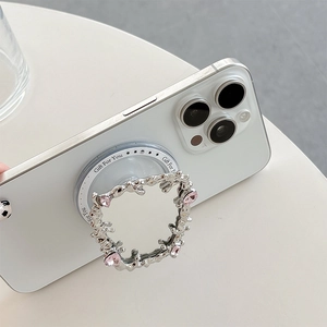 Silver lava metal phone griptok with pink rhinestones and Gift For You text on iPhone