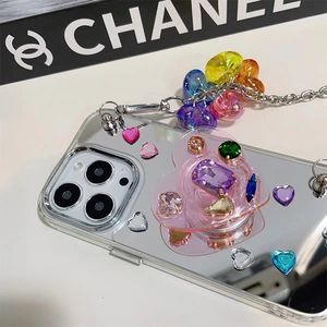 Detail of mirror phone case with heart rhinestone grip and colorful heart chain