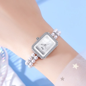 Elegant Gedi women quartz watch featuring luxury pearl strap and rhinestone bezel