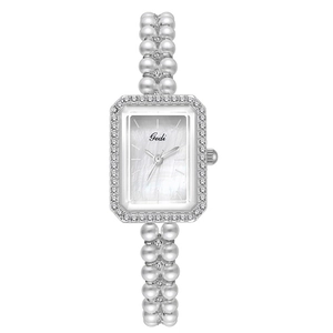 Elegant rectangular mother of pearl watch with white pearls and sparkling crystals