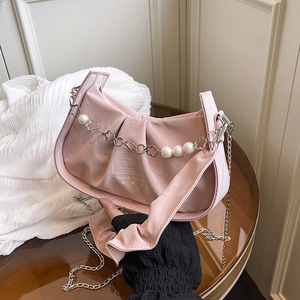 Pink pleated cloud bag with pearl chain and silk texture for French minimalist style