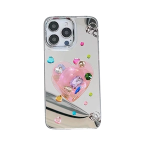 Mirror-finish phone case with large pink heart and colorful rhinestones for iPhone