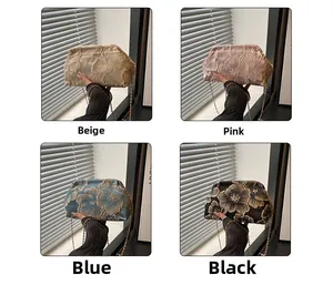 Floral jacquard cloud clutches in beige, pink, blue, and black with gold chains