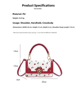 Detailed view of cherry print crossbody bag with size specs and woven handle