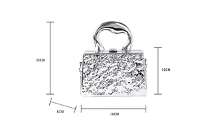 Dimensions of silver acrylic clutch bag showing height 21cm, width 18cm, and depth 8cm