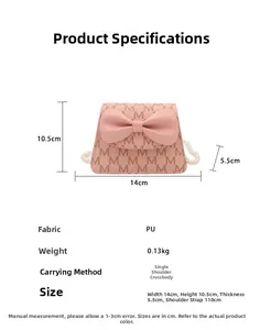 Detailed view of pink PU mini crossbody bag with bow, M print and pearl strap specs