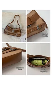Detail of vintage canvas and brown leather underarm bag with silver buckle and large interior