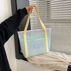 Summer mesh beach tote bag with large capacity for swimming and gym gear in light blue