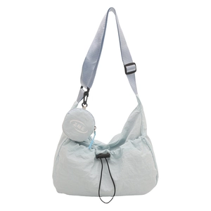 Light blue nylon hobo crossbody bag with drawstring detail and small logo coin purse