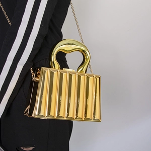 Golden acrylic mirror handbag with pleated design and circular handle for evening wear