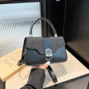 Schicke schwarze PU-Lederhandtasche mit Paillettenklappe und silberner Hufeisenschnalle
