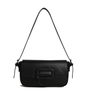 Minimalist black faux leather underarm bag with decorative leather-wrapped square buckle