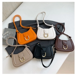 Minimalist half-moon shoulder bags in five colors with gold buckles and knot straps