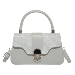 Elegant off-white PU leather shoulder bag with glitter flap and silver buckle closure