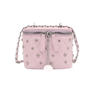 Elegant pink quilted box crossbody bag featuring rhinestone studs and classic chain strap