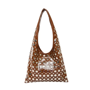 Brown rivet studded hobo bag in glossy leather with silver punk hardware detailing