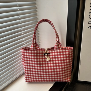Minimalist red and white gingham canvas tote bag with wooden toggle button closure