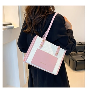 Pink and white textured leather tote bag with FASHION & BAGS lettering on the side pocket