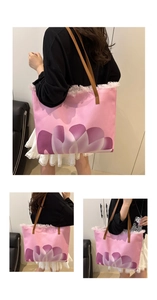 Three views of a pink canvas tote bag with floral print and white tassel fringe details