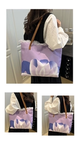 Three-panel view of a large purple floral tote bag with fringe and leather handles