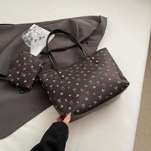 Niche designer brown tote bag with floral bow print and matching small zip pouch