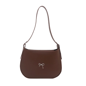 Minimalist dark brown leather crescent underarm bag with a silver metallic bow buckle