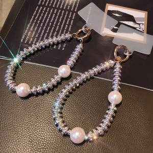 Short pearl and rhinestone phone lanyard with gold metal clasp and clear gaskets