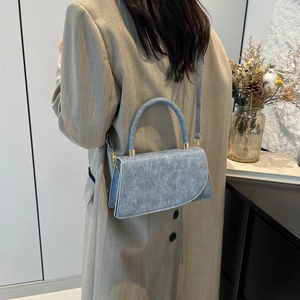 Blue textured crossbody small square bag with golden hardware and top handle for women