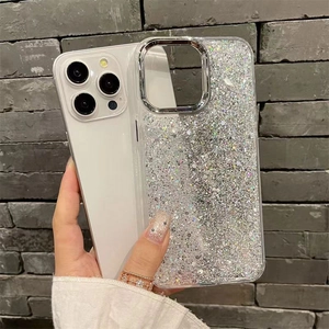 Close-up of silver glitter phone case for iPhone with protective raised lens frame detail