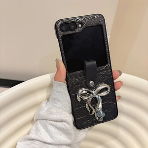 Detail of black crocodile texture phone case with silver metal bow for Samsung Z Flip